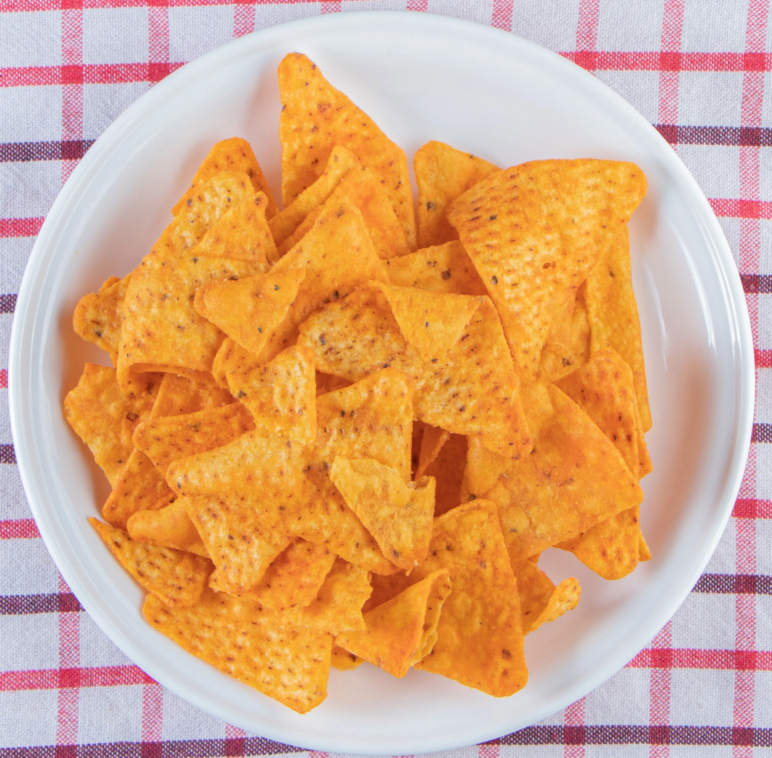 Permite incorporar el perfil queso cheddar en diferentes tipos de frituras, semillas, cacahuates y botanas.